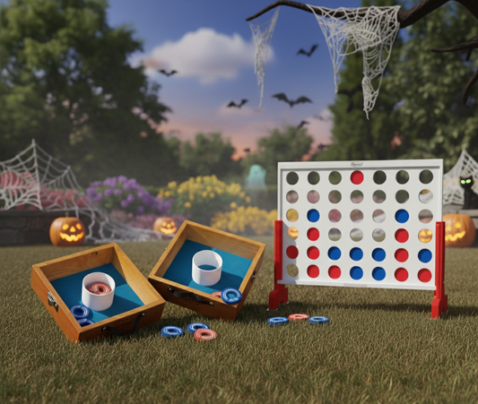 Outdoor Halloween-themed setup featuring BolaBall lawn games, including wooden ring toss boxes and a giant Connect Four game, surrounded by pumpkins, spider webs, and festive decorations.