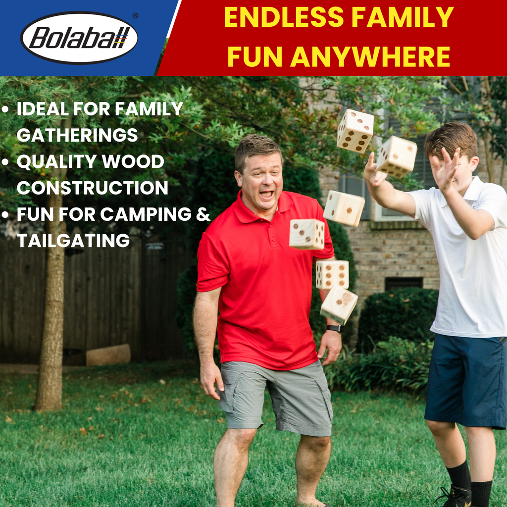 Player rolling giant wooden yard dice on lawn, fun outdoor game for family and group play