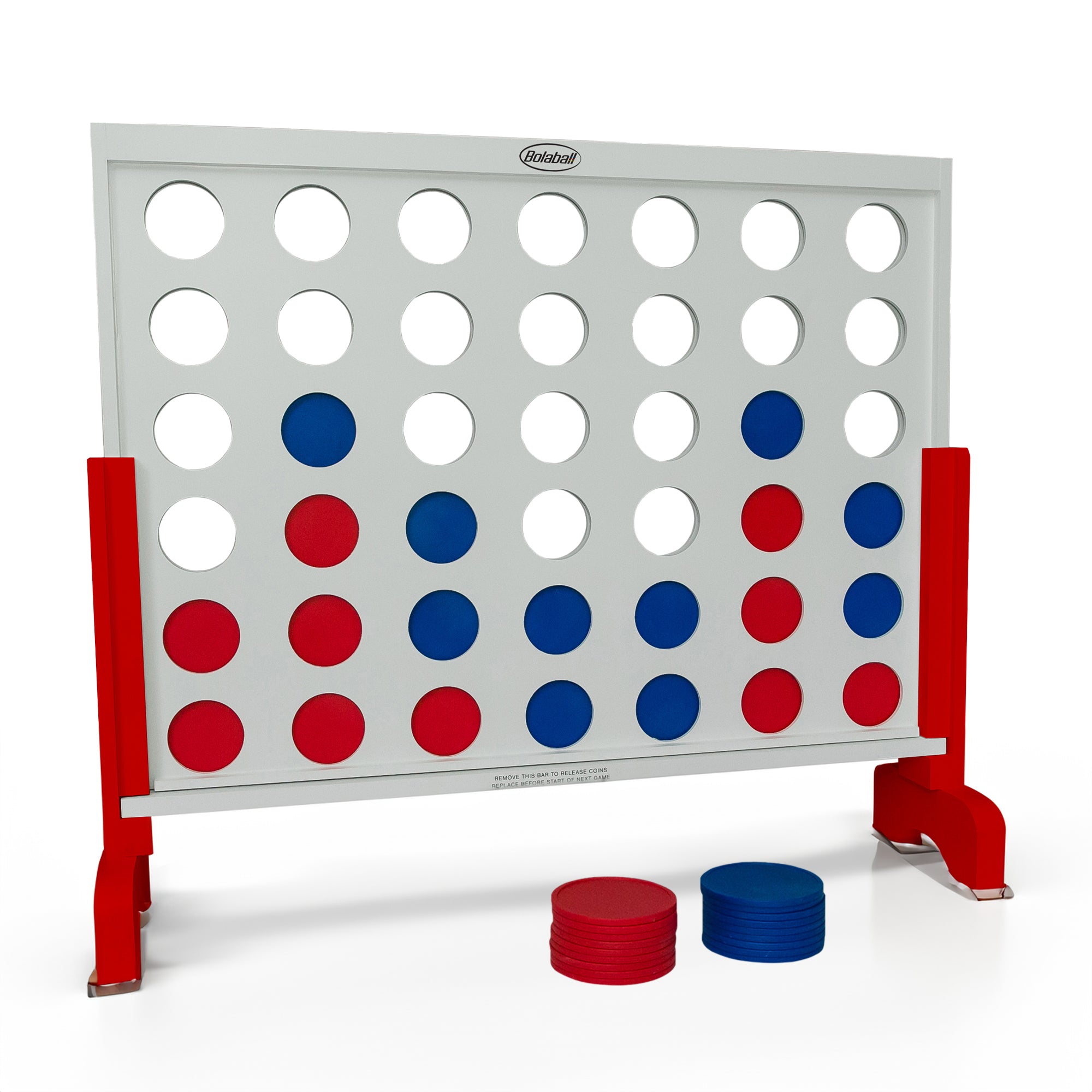 Bolaball giant 4 in a Row wooden game set up indoors, showing white frame and oversized discs for home play